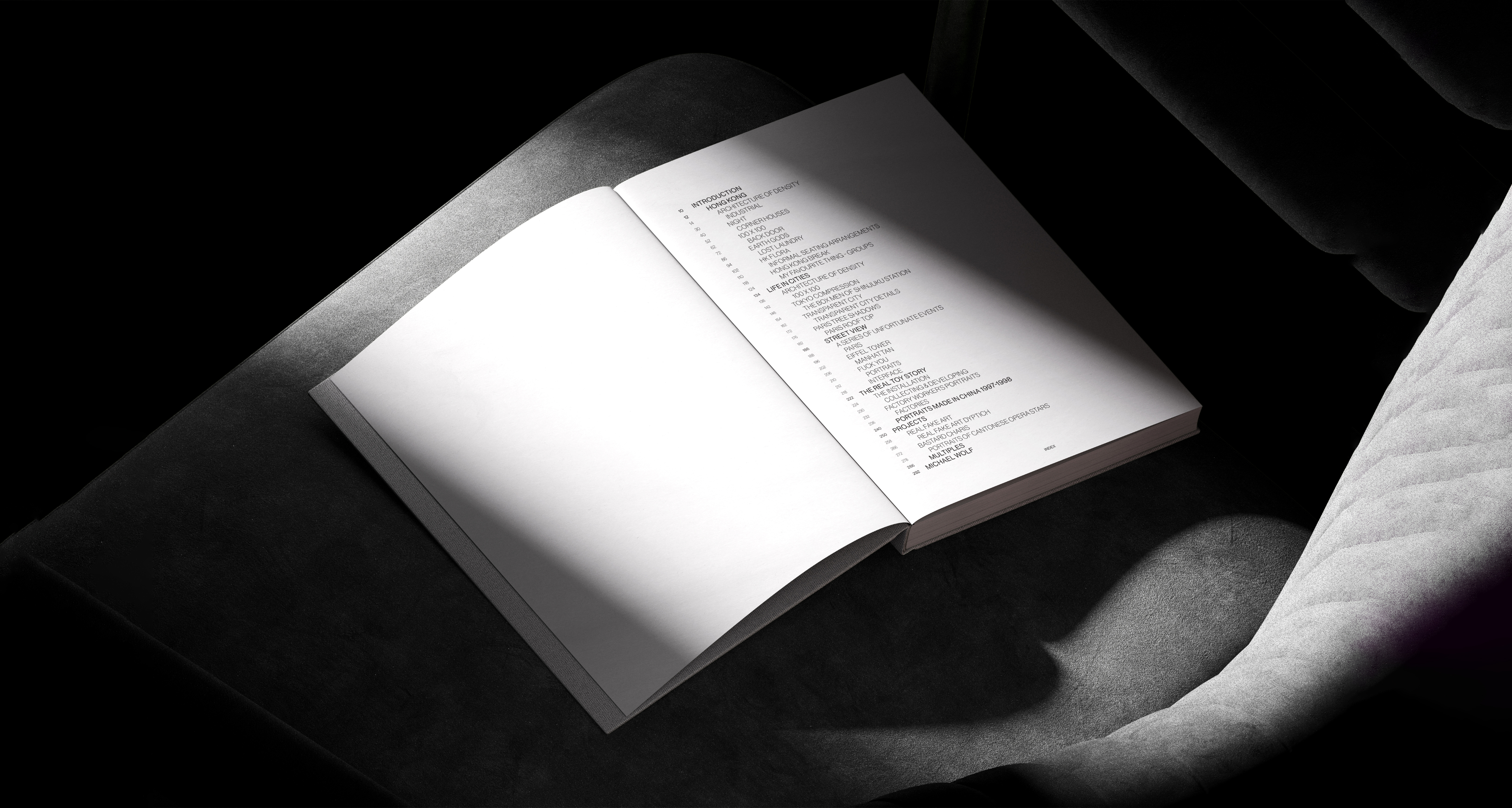 Anders brand wordmark in white placed on top of an image of a modern interior design.