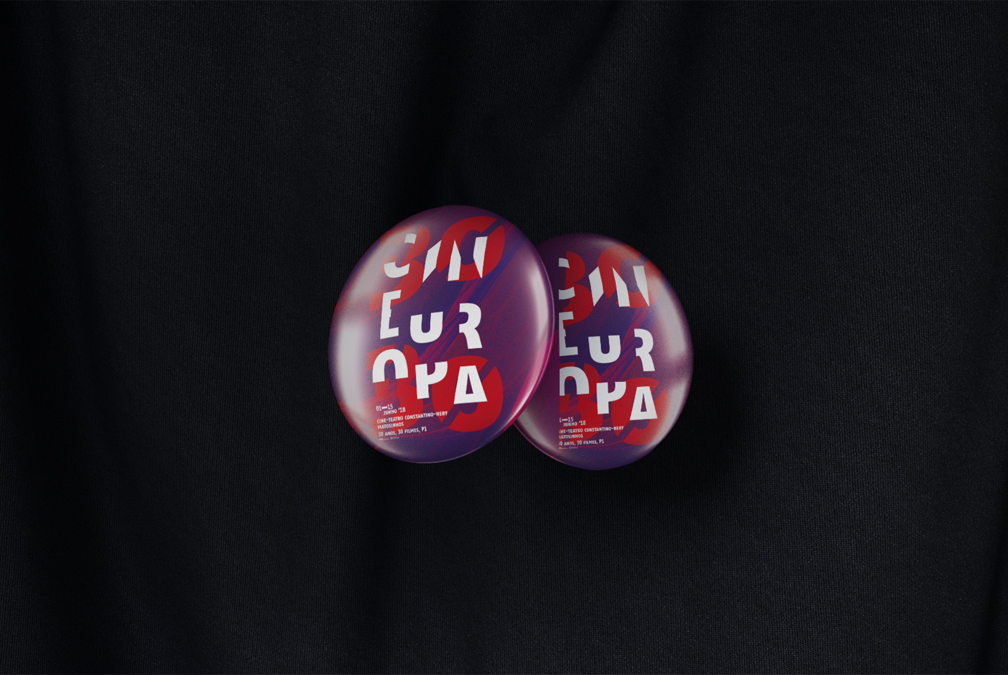 Graphic of a typography specimen showing the alphabet and numerals on top of a dark gray background.