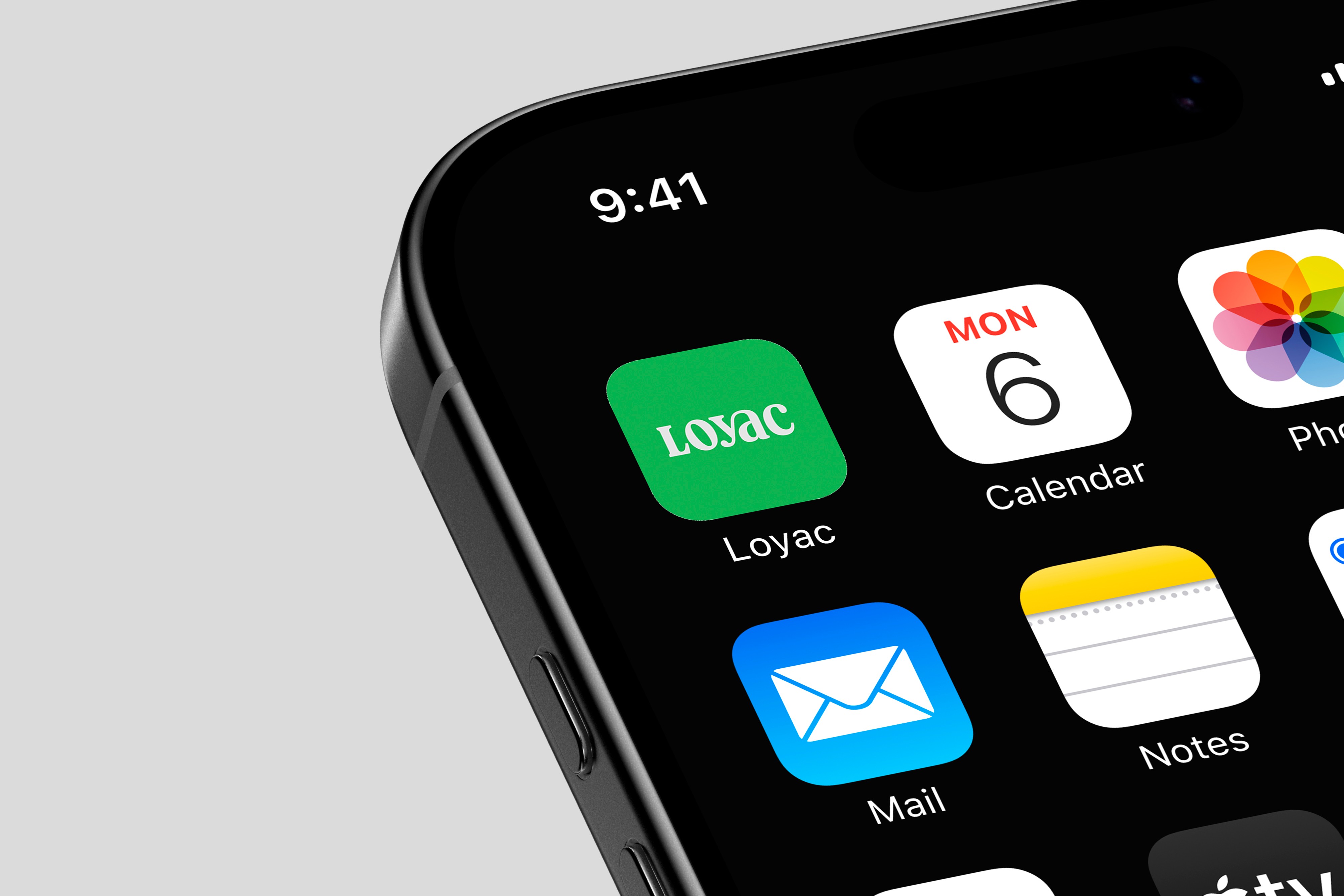 Stationery design of letterhead and business cards for the company Anders on top of a blurred photo of a house interior.